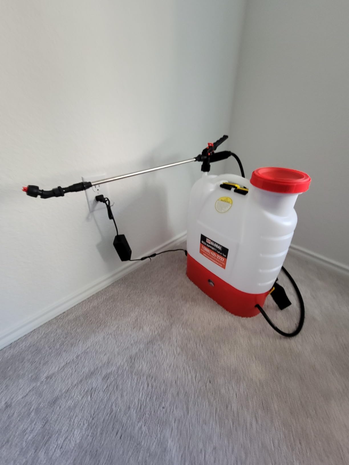 Backpack sprayer in use